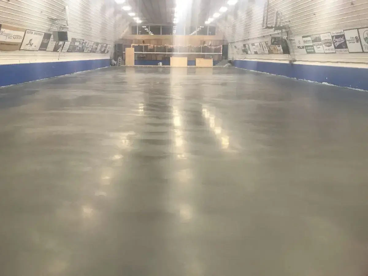 Smooth finished concrete floor inside a steel building